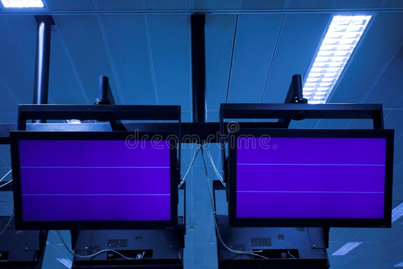 Screen in airport hall in blue. Screen in airport hall in blue