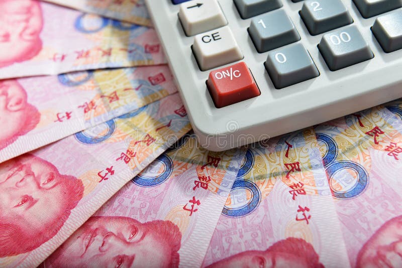 Billet de banque et calculatrice chinois de rmb d'argent photo libre de droits Billet de banque et calculatrice chinois de rmb d'argent photo libre de droits