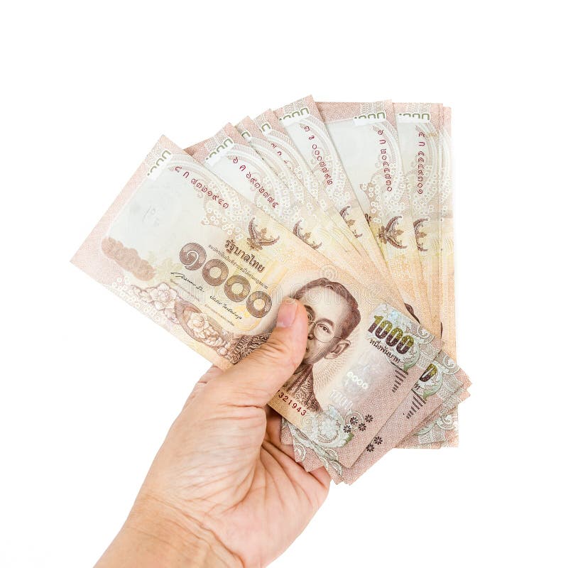 Billetes de banco del dinero de Tailandia a disposición del hombre fotografía de archivo libre de regalías Billetes de banco del dinero de Tailandia a disposición del hombre fotografía de archivo libre de regalías