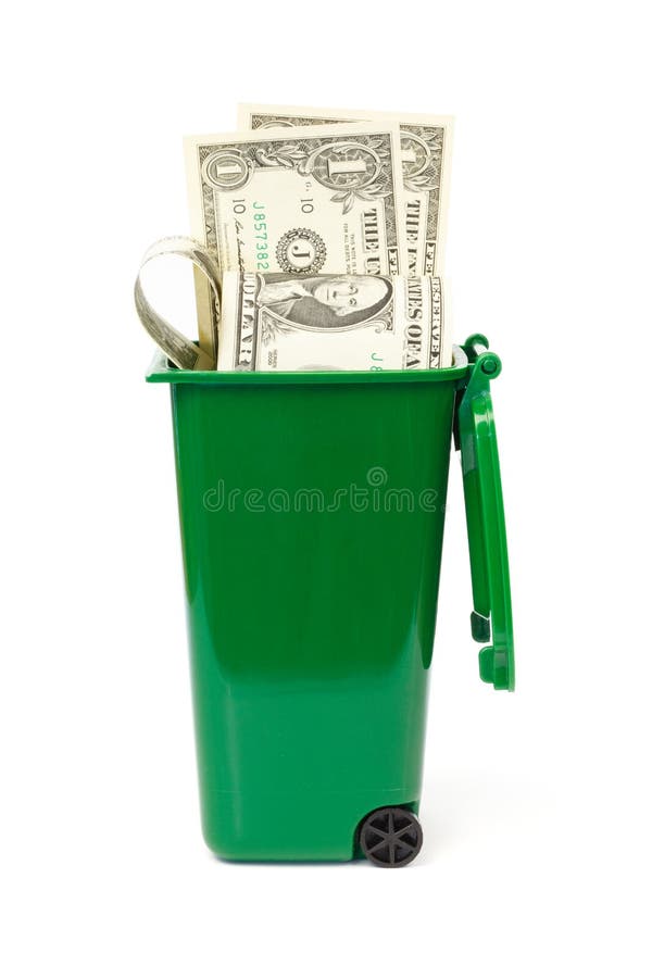 Dollar banknotes in green wheelie bin against white background. Dollar banknotes in green wheelie bin against white background