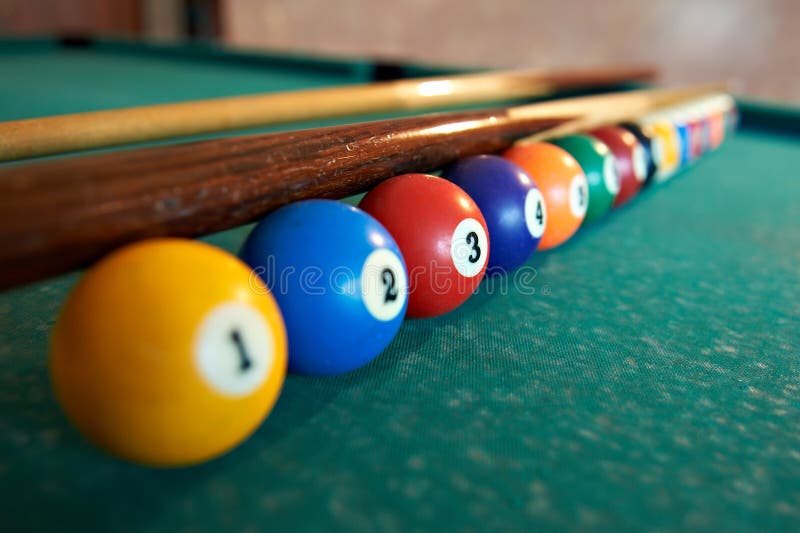 Billiard balls on green table royalty free stock images