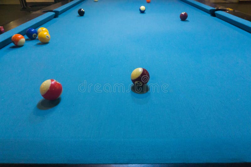 Billiards balls on blue turquois  billiards table. Billiard sport concept. Pool billiard game indoor