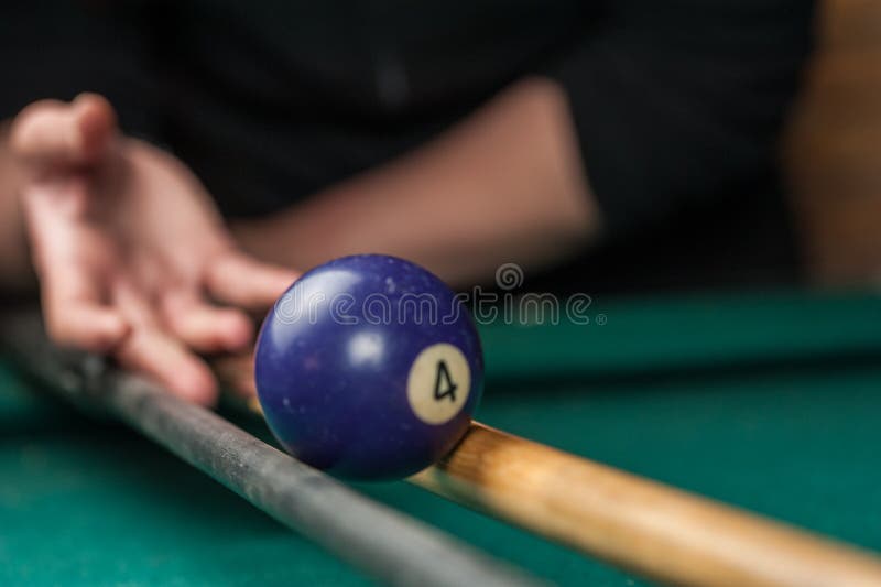 Billiards Balls and Cue on Billiards Table. Billiard Sport Concept
