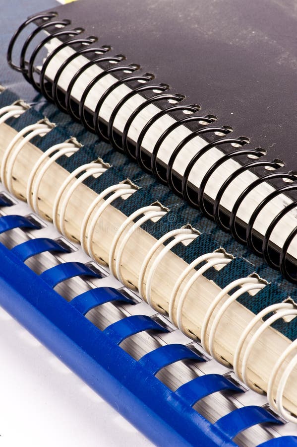 Three different binders on a white background. Atlas book stock images, royalty-free photos and pictures