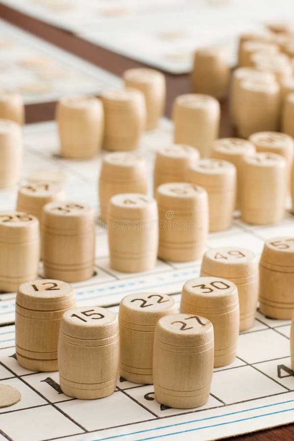 Background - bingo lottery cards with wooden kegs