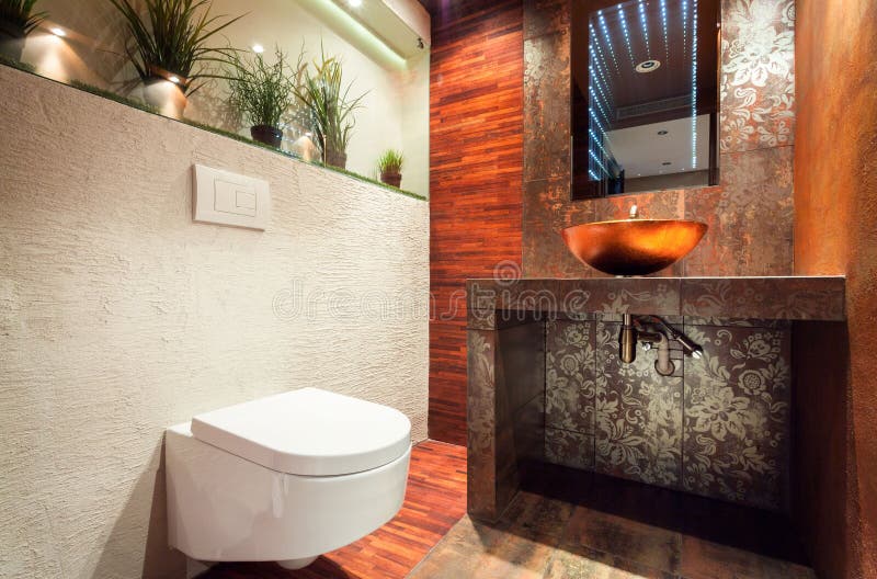 Horizontal view of interior of modern bathroom. Horizontal view of interior of modern bathroom