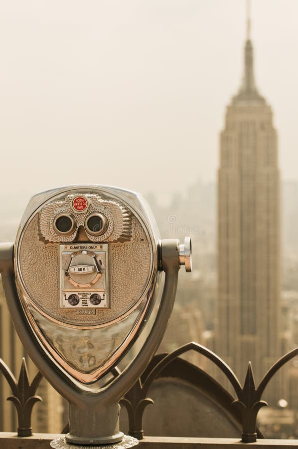 Binoculars viewing the Empire State Building royalty free stock photography
