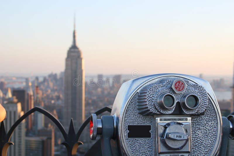 Binoculars viewing Empire State Building stock photography