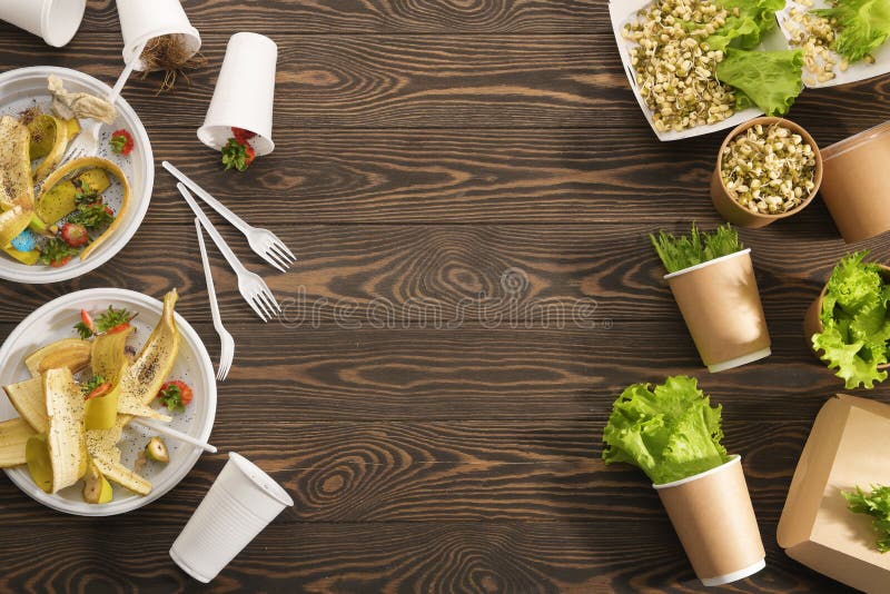 Biodegradable and plastic tableware on wooden background. Secondary processing. The concept of zero waste.