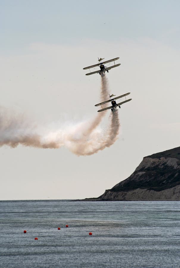 Utterly butterly wing walkers display team 2 1940 s super stearman biplanes with daredevils on the top wing of the aircraft. Utterly butterly wing walkers display team 2 1940 s super stearman biplanes with daredevils on the top wing of the aircraft.