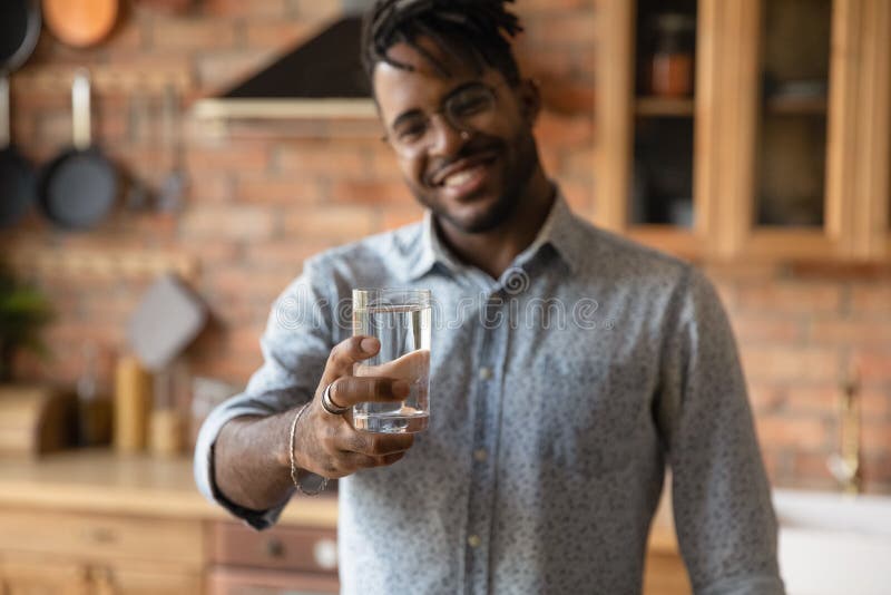 Biracial man recommend drinking clean mineral water