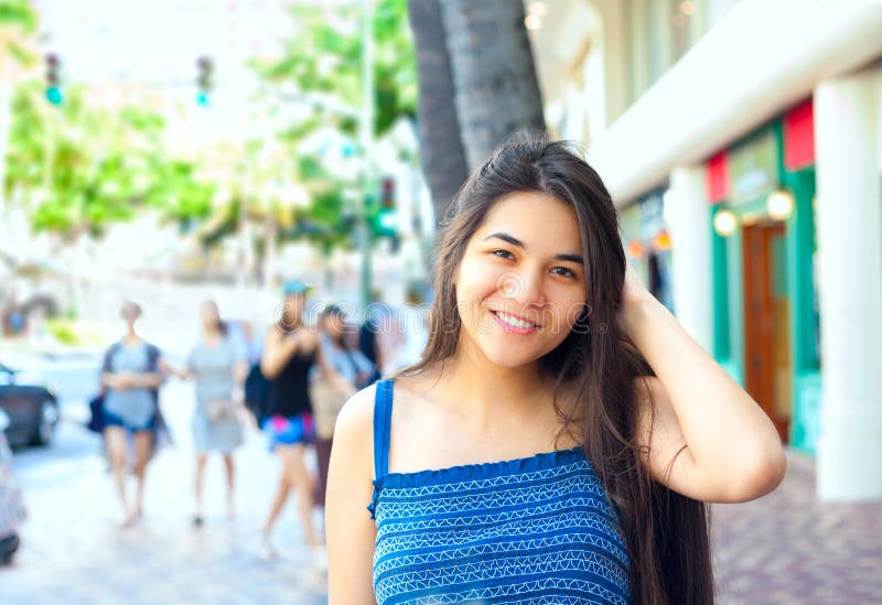 Biracial Teen Girl Smiling on Street in Waikiki Stock Photo - Image of ...