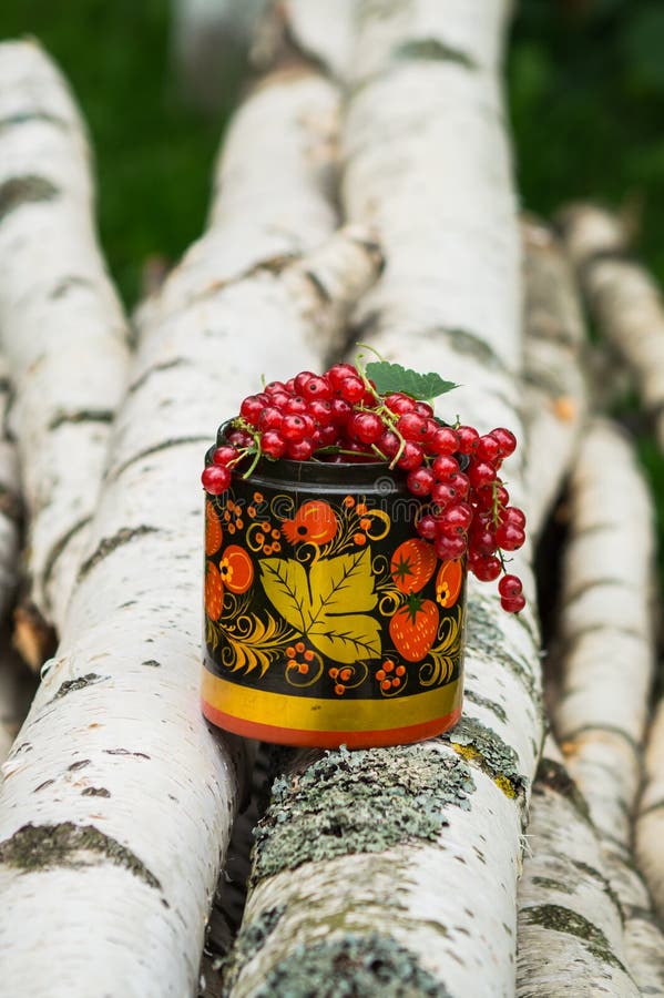 Birch Logs and Decorative Wooden Pot in Khokhloma Style, Overfilled by  Bunches of Ripe Red Currant. Stock Photo - Image of common, fruit: 105002708
