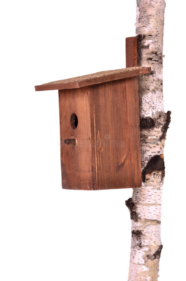 Birdhouse de madera en un vástago sobre blanco fotografía de archivo libre de regalías Birdhouse de madera en un vástago sobre blanco fotografía de archivo libre de regalías