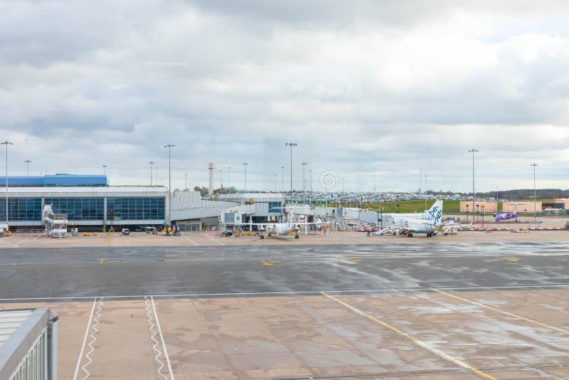 Birmingham/ UK - 03.03.19 : Birmingham Airport tarmac gates airplane royalty free stock photo Birmingham/ UK - 03.03.19 : Birmingham Airport tarmac gates airplane royalty free stock photo