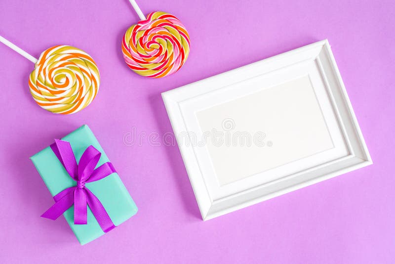 Birth of child - blank picture frame on purple background royalty free stock image Birth of child - blank picture frame on purple background royalty free stock image