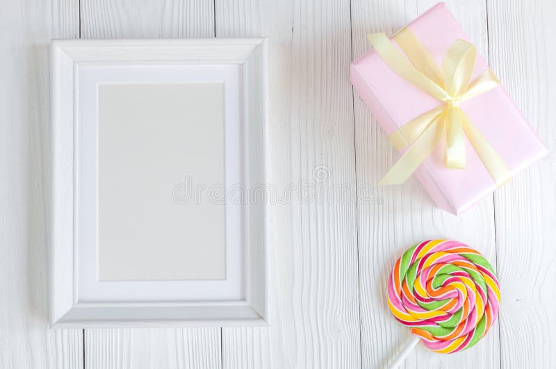 Birth of child - blank picture frame on wooden background royalty free stock images Birth of child - blank picture frame on wooden background royalty free stock images