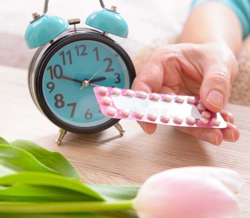 Birth control, contraceptive pills in hand royalty free stock image Birth control, contraceptive pills in hand royalty free stock image