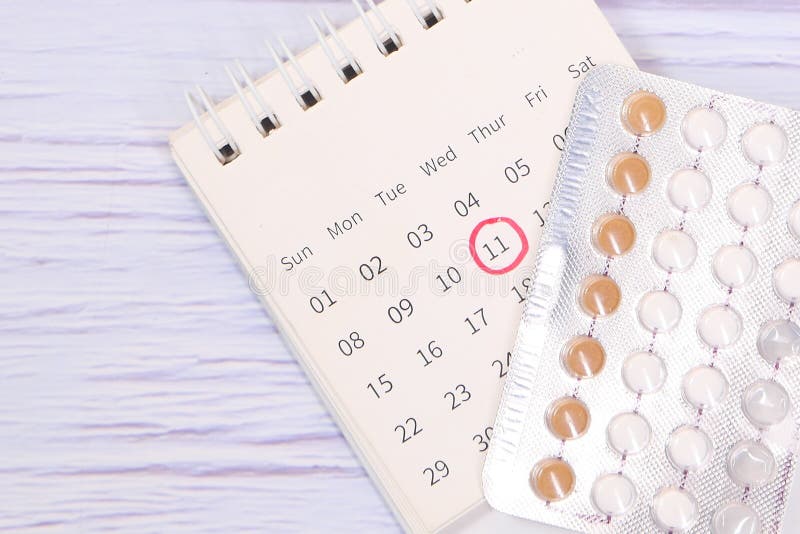 Birth Control Pills , Calendar and Notepad on Table Stock Image Image