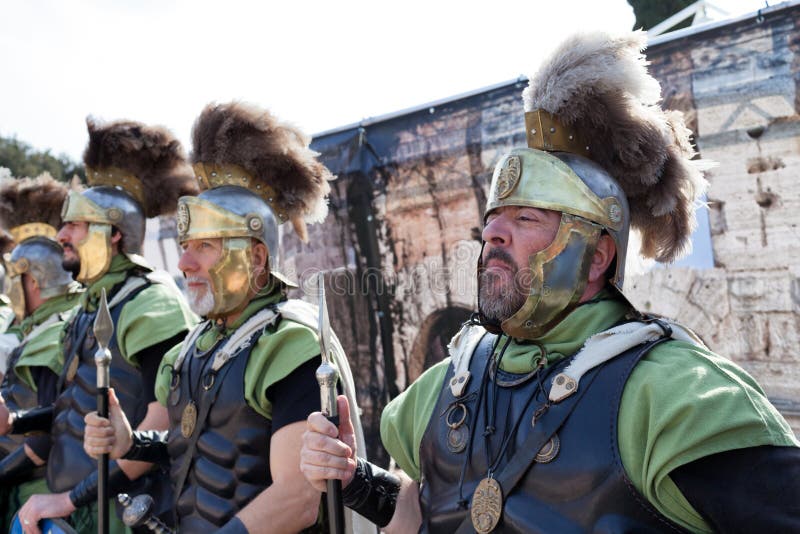 ROME, ITALY - APRIL 19, 2015: Birth of Rome festival - Actors dressed as ancient Roman Praetorian soldiers attend a parade to commemorate the 2,768th anniversary of the founding of Rome. ROME, ITALY - APRIL 19, 2015: Birth of Rome festival - Actors dressed as ancient Roman Praetorian soldiers attend a parade to commemorate the 2,768th anniversary of the founding of Rome.