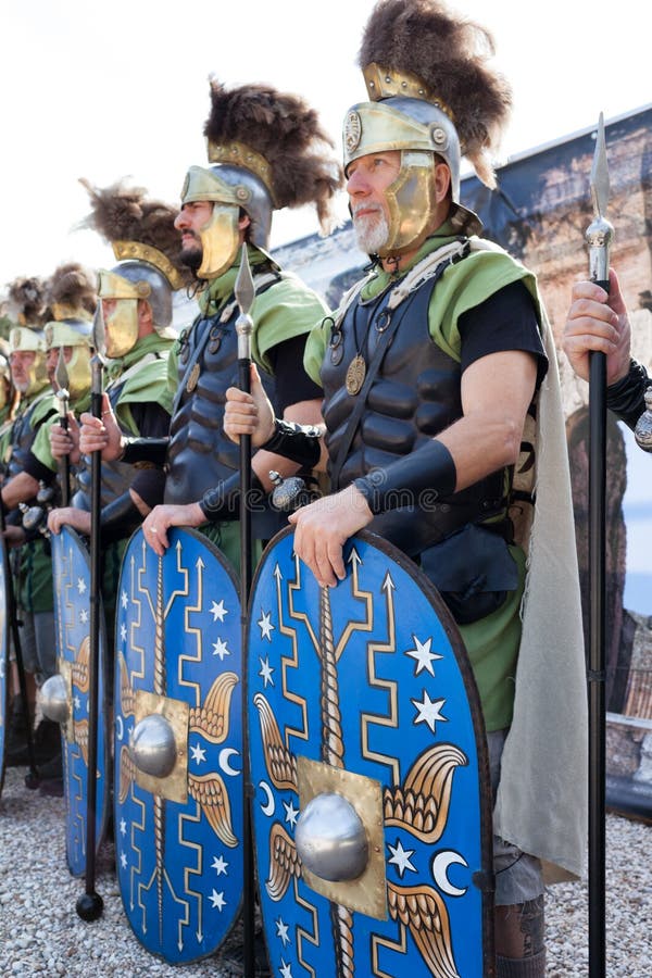 ROME, ITALY - APRIL 19, 2015: Birth of Rome festival - Actors dressed as ancient Roman Praetorian soldiers attend a parade to commemorate the 2,768th anniversary of the founding of Rome. ROME, ITALY - APRIL 19, 2015: Birth of Rome festival - Actors dressed as ancient Roman Praetorian soldiers attend a parade to commemorate the 2,768th anniversary of the founding of Rome.