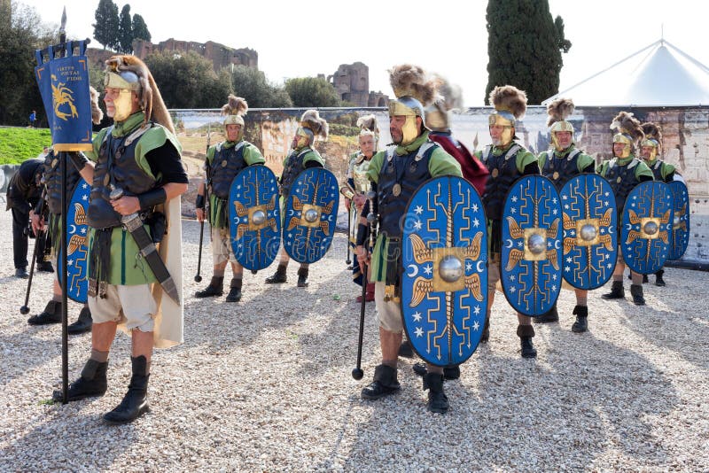 ROME, ITALY - APRIL 19, 2015: Birth of Rome festival - Actors dressed as ancient Roman Praetorian soldiers attend a parade to commemorate the 2,768th anniversary of the founding of Rome. ROME, ITALY - APRIL 19, 2015: Birth of Rome festival - Actors dressed as ancient Roman Praetorian soldiers attend a parade to commemorate the 2,768th anniversary of the founding of Rome.