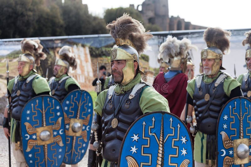 ROME, ITALY - APRIL 19, 2015: Birth of Rome festival - Actors dressed as ancient Roman Praetorian soldiers attend a parade to commemorate the 2,768th anniversary of the founding of Rome. ROME, ITALY - APRIL 19, 2015: Birth of Rome festival - Actors dressed as ancient Roman Praetorian soldiers attend a parade to commemorate the 2,768th anniversary of the founding of Rome.