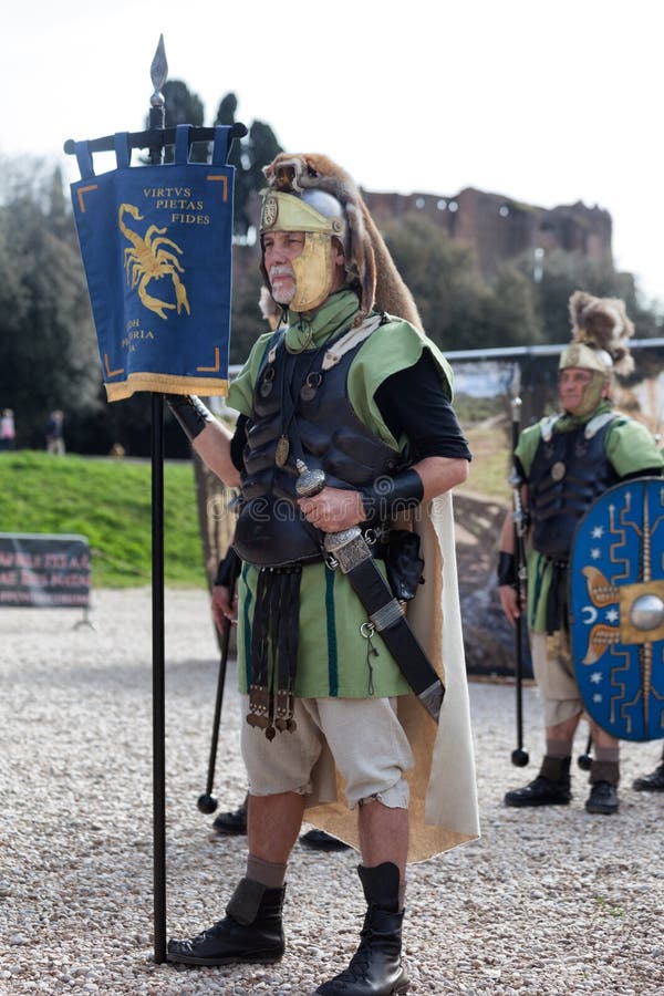 ROME, ITALY - APRIL 19, 2015: Birth of Rome festival - Actors dressed as ancient Roman Praetorian soldiers attend a parade to commemorate the 2,768th anniversary of the founding of Rome. ROME, ITALY - APRIL 19, 2015: Birth of Rome festival - Actors dressed as ancient Roman Praetorian soldiers attend a parade to commemorate the 2,768th anniversary of the founding of Rome.