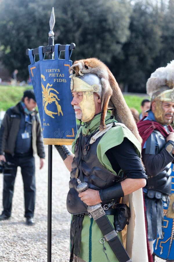 ROME, ITALY - APRIL 19, 2015: Birth of Rome festival - Actors dressed as ancient Roman Praetorian soldiers attend a parade to commemorate the 2,768th anniversary of the founding of Rome. ROME, ITALY - APRIL 19, 2015: Birth of Rome festival - Actors dressed as ancient Roman Praetorian soldiers attend a parade to commemorate the 2,768th anniversary of the founding of Rome.