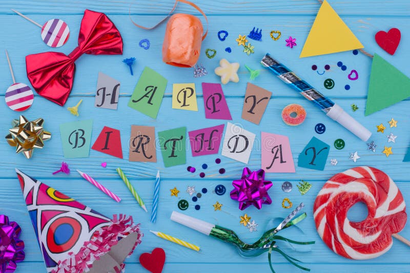 Birthday Accessories On Color Wooden Background. Stock Photo - Image of ...
