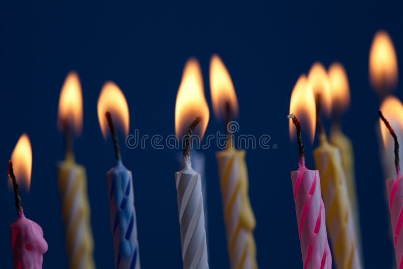 Many candels in birthday cake