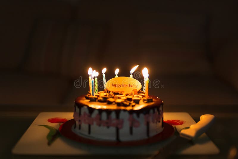 Birthday Cake on Black Background with Colorful Candles Lit. Stock Image -  Image of happy, bright: 199470473