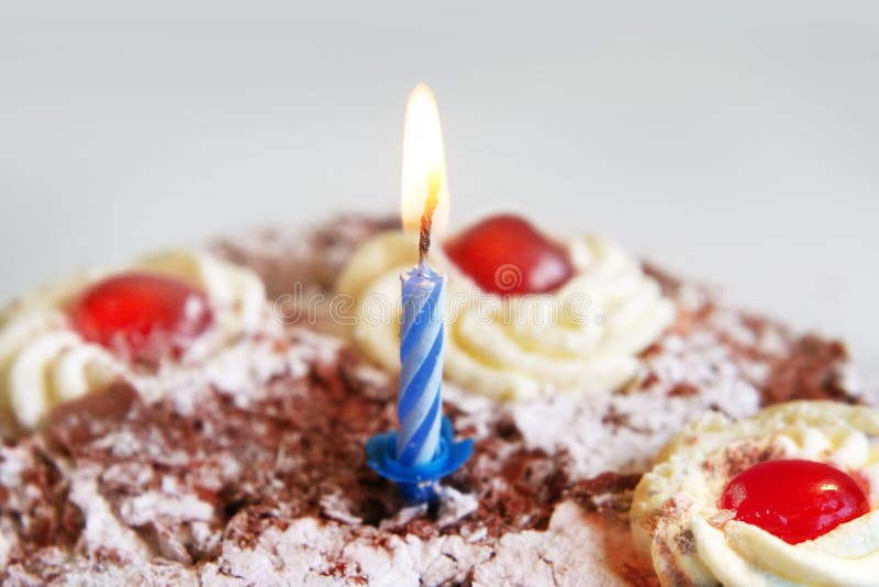 Birthday Cake with Blue Candle Stock Photo Image of flame, luscious