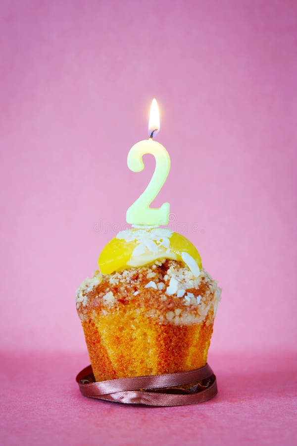 Birthday Cake with Burning Candle As Number Two Stock Image - Image of ...