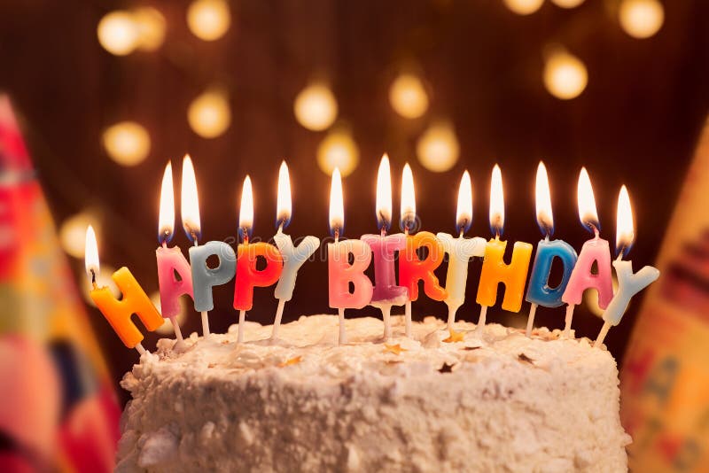 Birthday Cake with Candles, Bright Lights Bokeh.Celebration Stock Image
