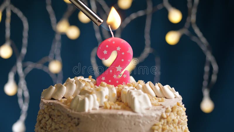 Birthday Cake With 2 Number Pink Candle On Blue Backgraund. Candles Are ...
