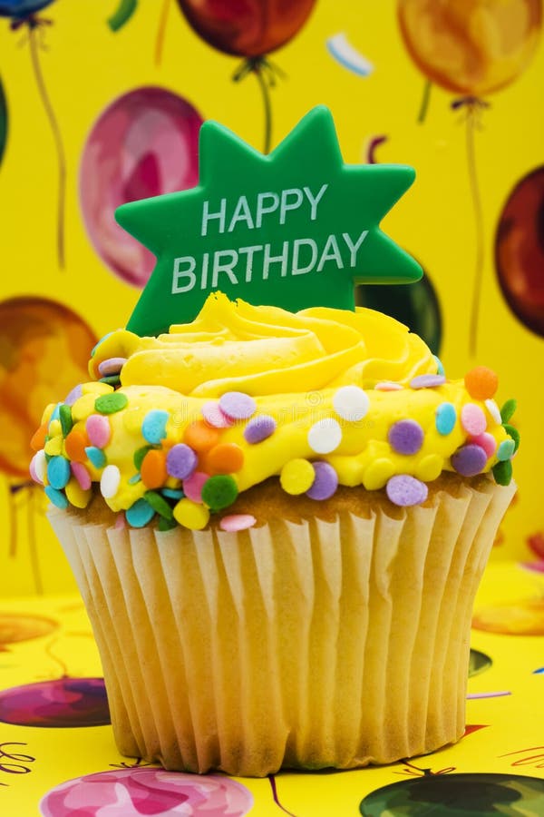 Birthday Cupcake. With balloon background- celebration time stock images Birthday Cupcake. With balloon background- celebration time stock images