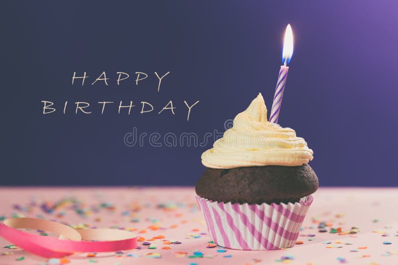 Birthday cupcake with candle stock images Birthday cupcake with candle stock images