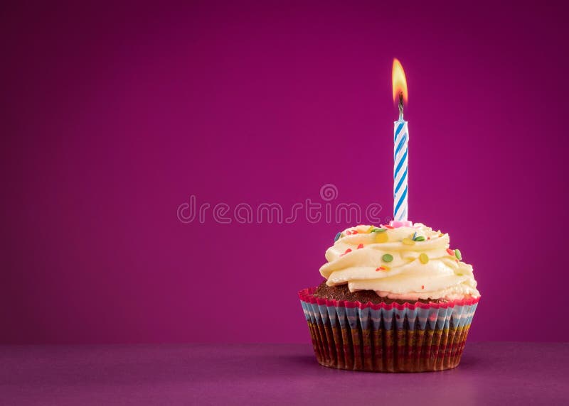Birthday cupcake. On the pink background royalty free stock images Birthday cupcake. On the pink background royalty free stock images