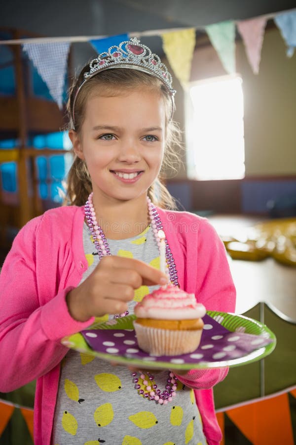 Birthday Girl Holding a Cupcake Stock Photo Image of homey, holding 97373832