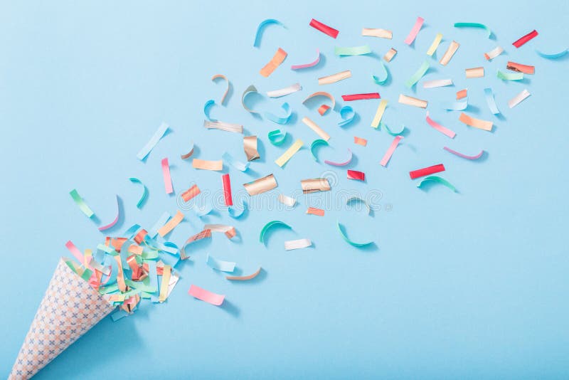 Birthday hat with confetti on paper background royalty free stock photography Birthday hat with confetti on paper background royalty free stock photography