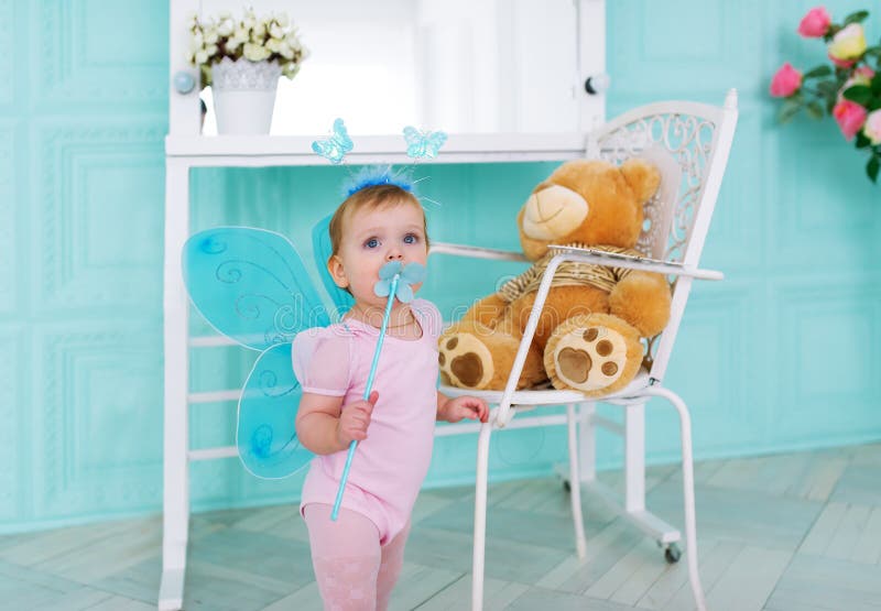 Birthday of the little girl. She is dressed in a suit of the little fairy royalty free stock photos Birthday of the little girl. She is dressed in a suit of the little fairy royalty free stock photos
