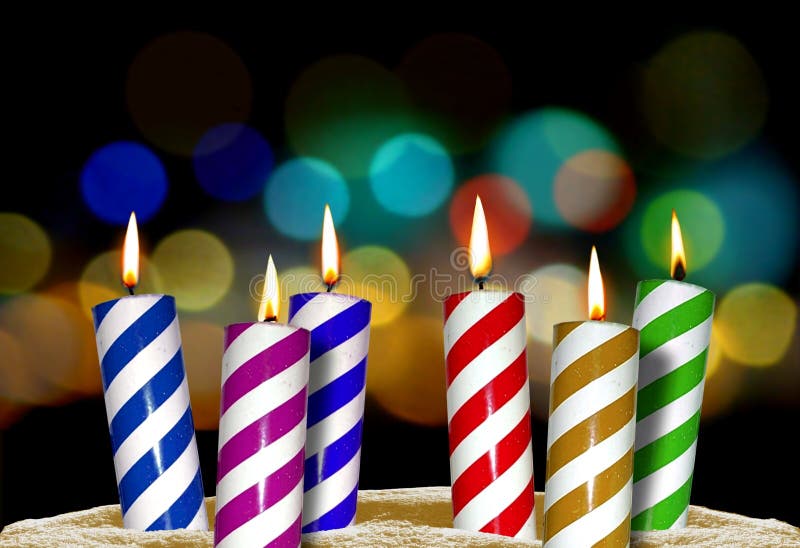 Image of six birthday party candles with blur background