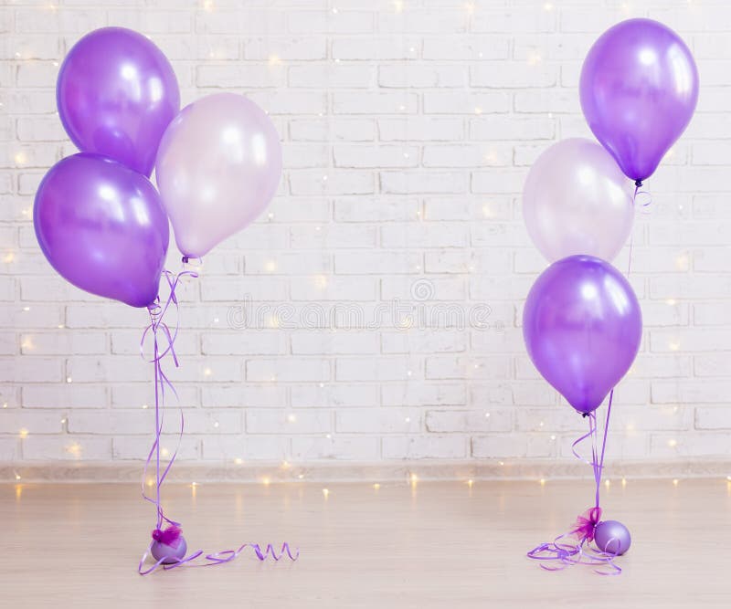 Birthday party concept - brick wall background with lights and a. Birthday party concept - brick wall background with lights and purple air balloons royalty free stock photos Birthday party concept - brick wall background with lights and a. Birthday party concept - brick wall background with lights and purple air balloons royalty free stock photos