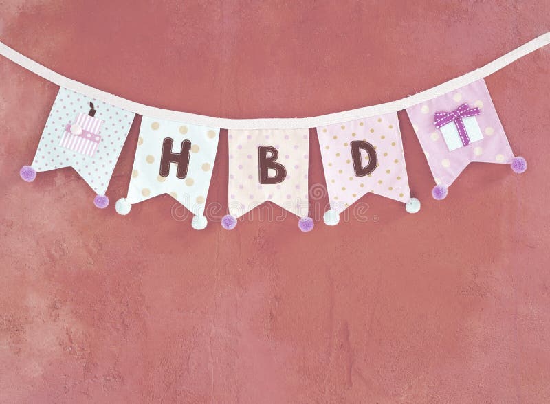 Birthday party flag design idea, design fabric party flag on pink texture background royalty free stock image Birthday party flag design idea, design fabric party flag on pink texture background royalty free stock image