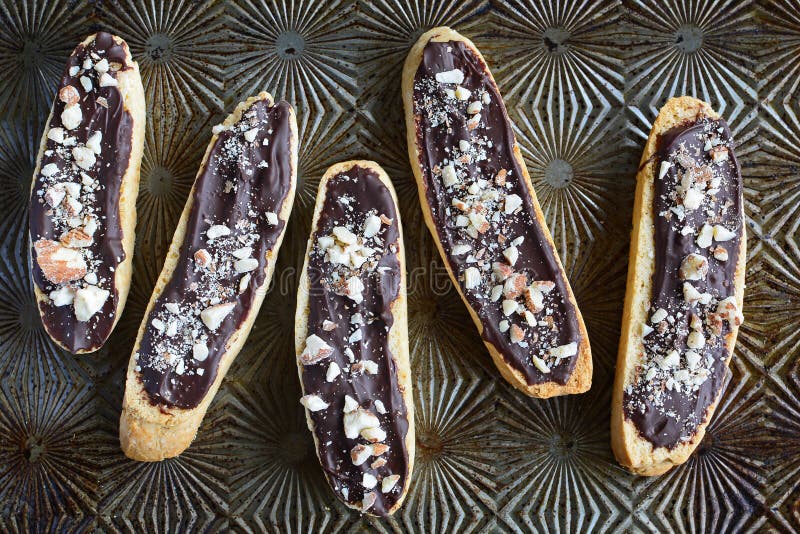 Crisp biscotti, crunchy almond topping, decadent dark semi-sweet chocolate all in a gluten free treat. Crisp biscotti, crunchy almond topping, decadent dark semi-sweet chocolate all in a gluten free treat