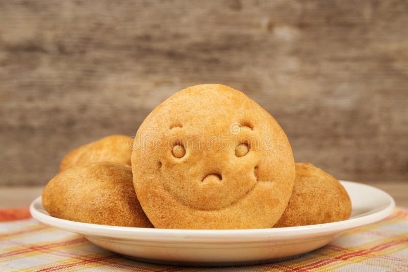Biscuit avec un sourire photo stock Biscuit avec un sourire photo stock