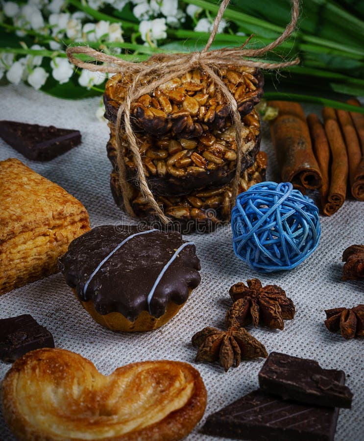 Very appetizing cookies from sunflower seeds, with cinnamon tubes stock photos Very appetizing cookies from sunflower seeds, with cinnamon tubes stock photos
