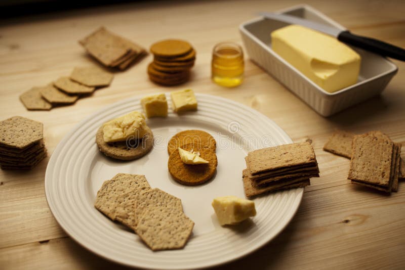 Biscuits, thé et miel pour tous photo stock Biscuits, thé et miel pour tous photo stock