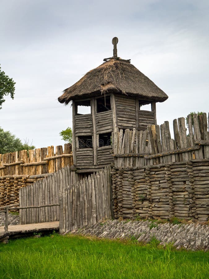 BISKUPIN, POLAND â€“ AUGUST 20, 2019: archaeological reserve, reconstruction of the settlement from the turn of the Bronze and Iron Age. BISKUPIN, POLAND â€“ AUGUST 20, 2019: archaeological reserve, reconstruction of the settlement from the turn of the Bronze and Iron Age